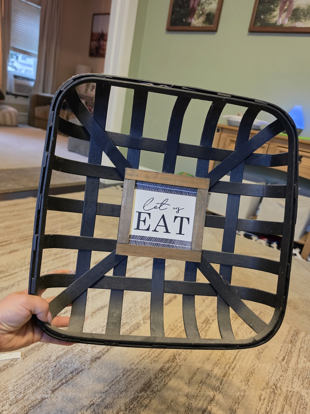 Black Decorative Woven Wall Basket with 'Let Us Eat' Sign